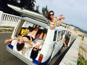 3 women travelling in a van